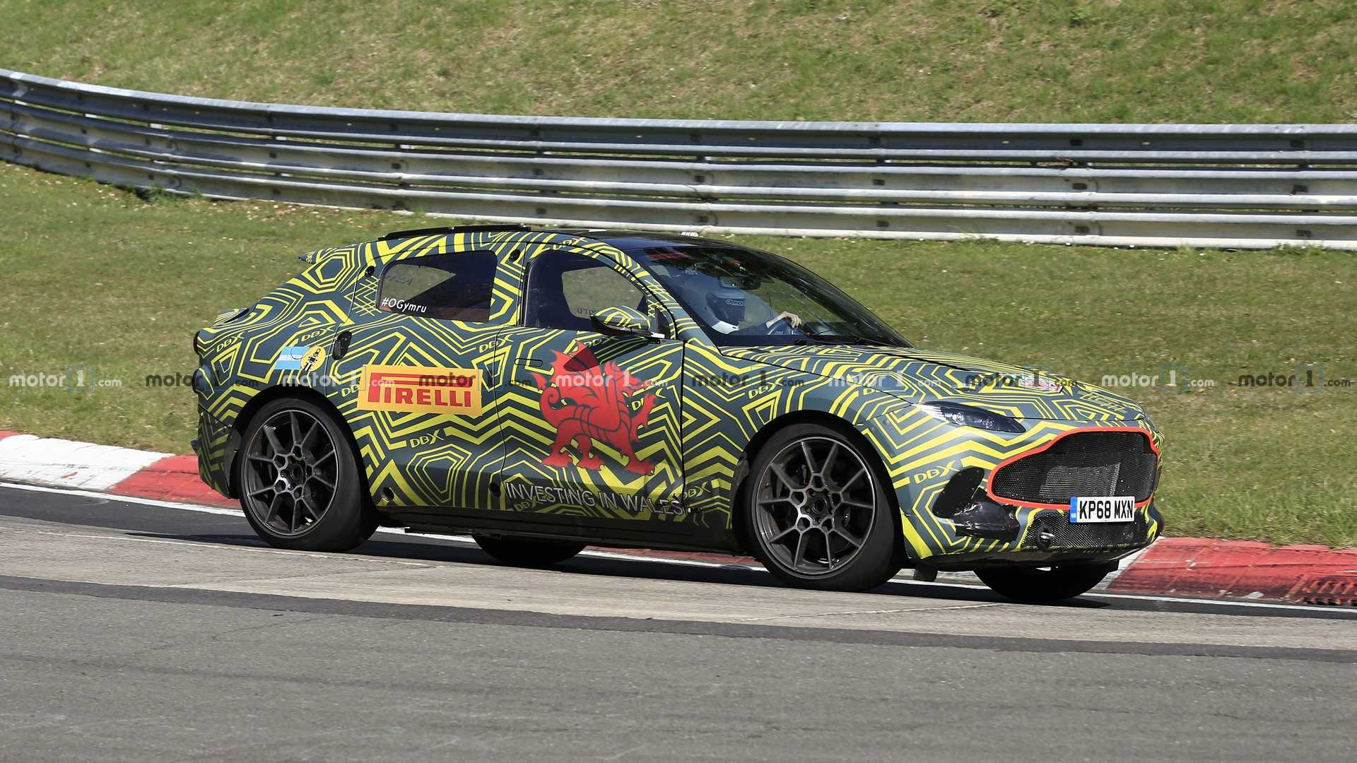 1558228851751013.jpg aston-martin-dbx-spy-photo (2).jpg